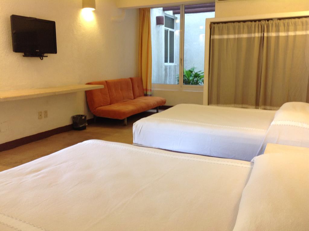 Hotel Plaza Tangolunda Εξωτερικό φωτογραφία